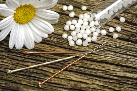 alternative medicine with homeopathy, globules and acupunctureの写真素材