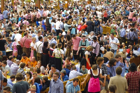 MUNICH, GERMANY - October 3: beer tent with dancing people at world biggest beer festival...
