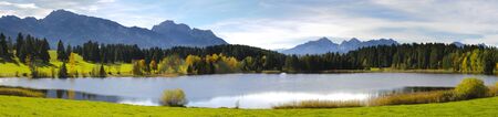 panorama view over beautiful rural landscape nearby city Fuessen in Bavaria, Germany