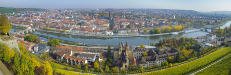 WUERZBURG, GERMANY - OCT 20: panorama view to the historical skyline of ancient city Wuerzburg and river Main, a very frequently visited town at german sightseeing tour on October 20, 2012 in Wuerzburg, Germanyのeditorial素材