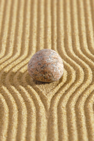 Japan zen garden with stones in raked sandの写真素材