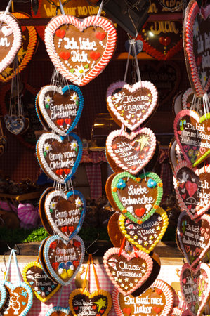 MUNICH, GERMANY - SEPTEMBER 23, 2014: The Oktoberfest in Munich is the biggest beer festival of the world with shops for sweets and hearts of gingerbread.のeditorial素材
