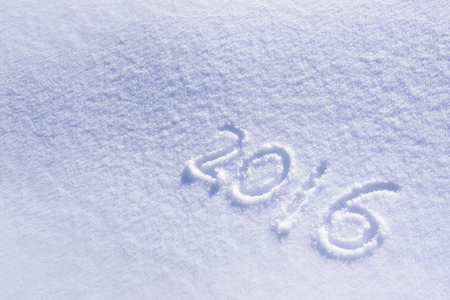 new year date 2016 written in powder snowの写真素材