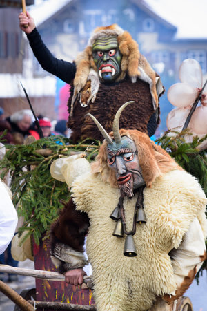 public carnival parade with colorful costumes at city Bad Hindelang in Bavaria, Germanyのeditorial素材