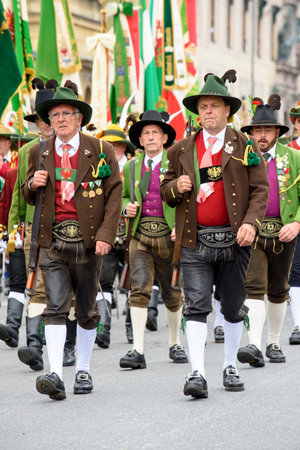 Munich, Germany -  September 20, 2015: The Oktoberfest is the world biggest beer festival and at the opening parade with rd. 9000 participants take part in historical costumes, music bands and horses.のeditorial素材