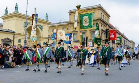 Munich, Germany -  September 20, 2015: The Oktoberfest in Munich, Germany, is the biggest beer festival of th world. About 9000 people in historical costume groups, music bands, artists or riders with horses and carriages have participated at the public oのeditorial素材