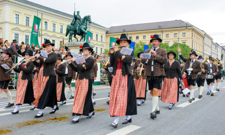 Munich, Germany -  September 20, 2015:  The Oktoberfest is the world biggest beer festival and at the opening parade with rd. 9000 participants take part in historical costumes, music bands and horses.のeditorial素材