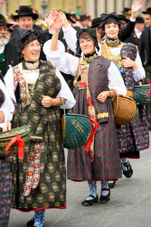 Munich, Germany -  September 20, 2015:  The Oktoberfest in Munich, Germany, is the biggest beer festival of th world. About 9000 people in historical costume groups, music bands, artists or riders with horses and carriages have participated at the public のeditorial素材