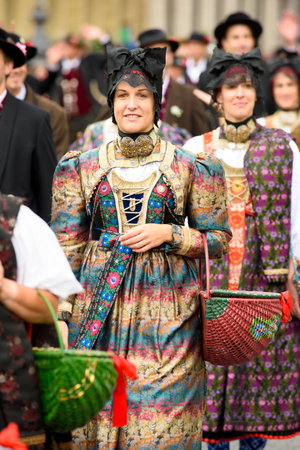 Munich, Germany -  September 20, 2015:  The Oktoberfest in Munich, Germany, is the biggest beer festival of th world. About 9000 people in historical costume groups, music bands, artists or riders with horses and carriages have participated at the public のeditorial素材