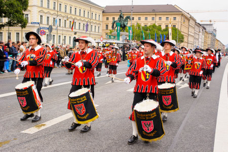 Munich, Germany -  September 20, 2015: The Oktoberfest is the world biggest beer festival and at the opening parade with rd. 9000 participants take part with historical costumes, music bands and horsesのeditorial素材