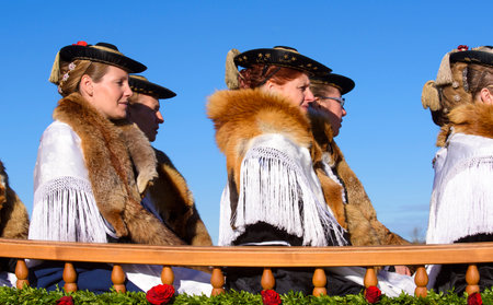Murnau, Bavaria, Germany - November 6, 2015:  Every year at the memorial day of St. Leonhard a catholic procession takes place with many decorated horses, carriages and people in bavarian clothes.のeditorial素材