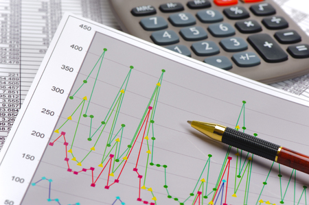 chart and calculator show success at stock marketの写真素材