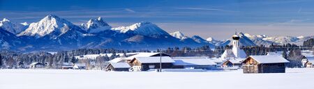 rural panorama landscape in Bavaria at winter with snowの写真素材