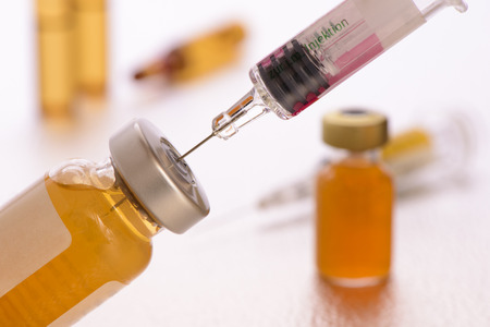 injection with syringe in medical laboratoryの写真素材