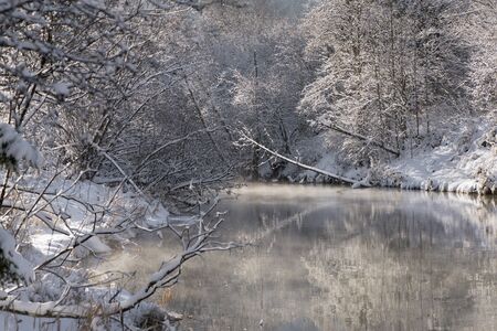 panorama scene with ice and snow at river in Bavaria, Germanyの写真素材