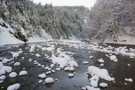panorama scene with ice and snow at river in Bavaria, Germany
