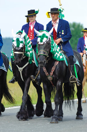 every year at Whitsun a catholic horse procession with many riders in traditional costume takes place in KÃ¶tzting, Bavaria, Germanyのeditorial素材