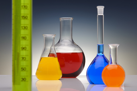 scientific experiment in chemistry laboratory with liquid in test tubesの写真素材