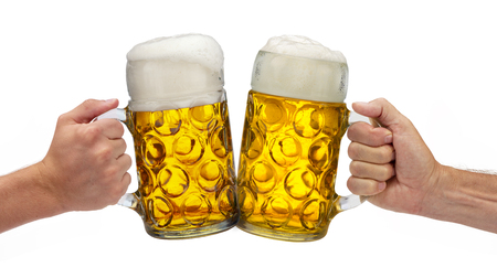 isolated beer mug in hand at Oktoberfest in Munichの写真素材