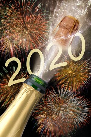 Happy new year 2020 with firework and splashing bottle of champagne