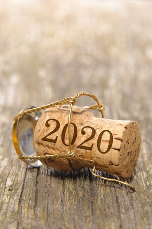 Happy new year 2020 with cork of champagneの写真素材