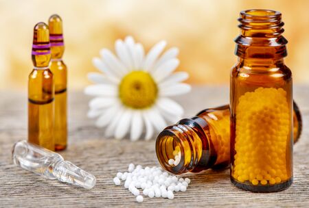 alternative medicine with homeopathy and herbal pillsの写真素材