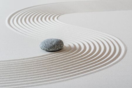 Japanese ZEN garden with stone in sandの写真素材