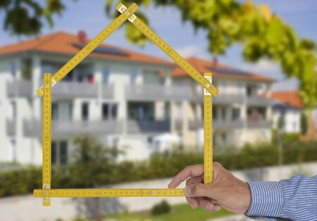 newly built house with a yardstickの写真素材