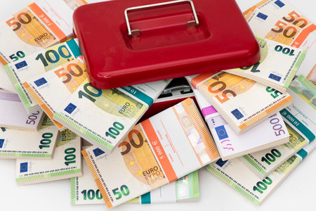cash box with bundles of euro banknotes