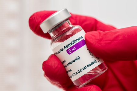 original vials with vaccine against covid-19 virusのeditorial素材