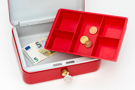 cash box with little euro banknotesの写真素材