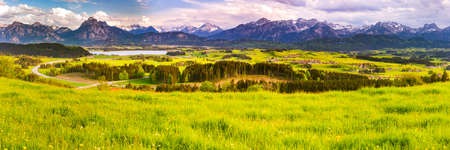 Panoramic landscape in Bavaria with mountain range and lakeの写真素材