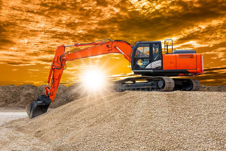 excavator is digging on construction site