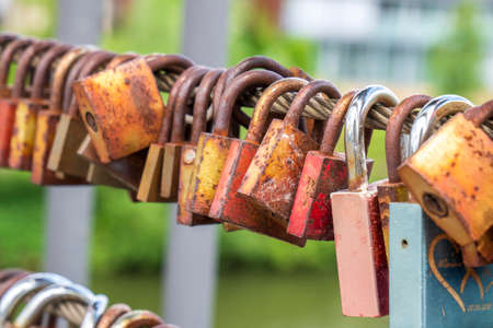love locks hanging on a bridge