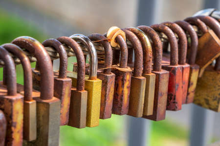 love locks hanging on a bridgeの写真素材