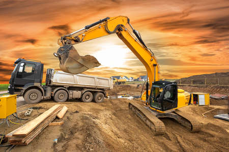 excavator is digging at construction siteの写真素材
