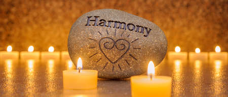 Japanese zen garden with stone and candlelight