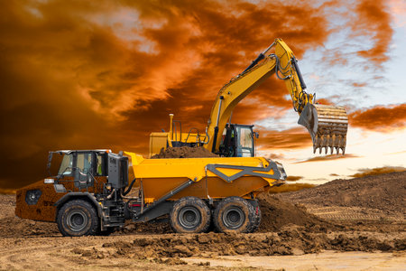 excavator is digging at construction siteの写真素材