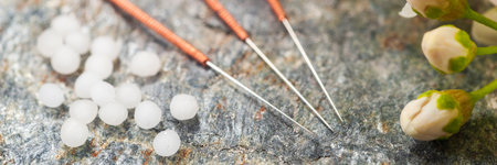 alternative medicine with herbal pills and acupunctureの写真素材