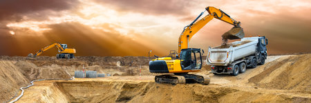 excavator is working and digging at construction site