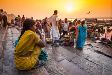 Crowd of local Indian live their morning life with Ganga river on April 18, 2010 in Varanasi, India. The most holy river of India and Hindu culture.のeditorial素材