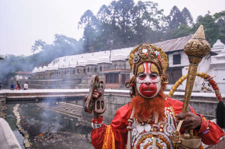 A Hindus dress like the avatar of Hanuman, a Hindu deity, who was an ardent devotee of Rama according to the Hindu legends on April 16, 2010 in Kathmandu, Nepal.のeditorial素材