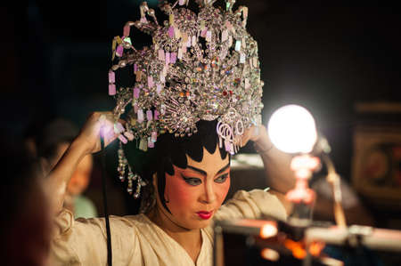 BANGKOK, THAILAND - JANUARY 17: A Chinese actor is doing make up before the show of traditional Chinese operaのeditorial素材