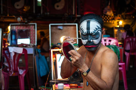 BANGKOK, THAILAND - JANUARY 17: A Chinese actor is doing make up before the show of traditional Chinese operaのeditorial素材