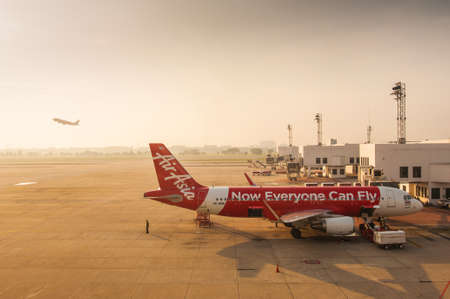 BANGKOK,THAILAND-APRIL 28: "Air Asia" a low cost Asian airlines is waiting for take off in Don Muang international airport on April 28, 2015のeditorial素材