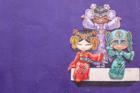 Georgetown, Penang, Malaysia - February 18, 2015: "Three chinese dolls on the wall" street art on wall in George Town, Penang, Malaysia.のeditorial素材