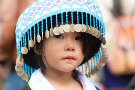 A little girl of local mountaineer tribe 'Hmong' is dressing with traditional costume in Luang Prabang, Laos.のeditorial素材