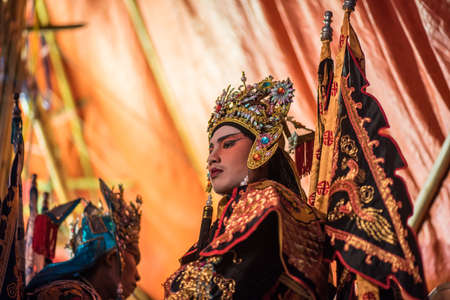 A Chinese actor is doing make up before the show of traditional Chinese opera.のeditorial素材