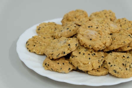 Moldy bread  on white dish against gray backgroundの写真素材