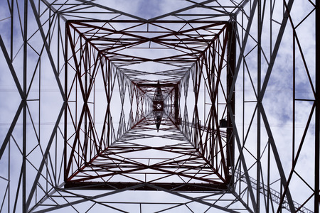 High-voltage tower sky backgroundの写真素材